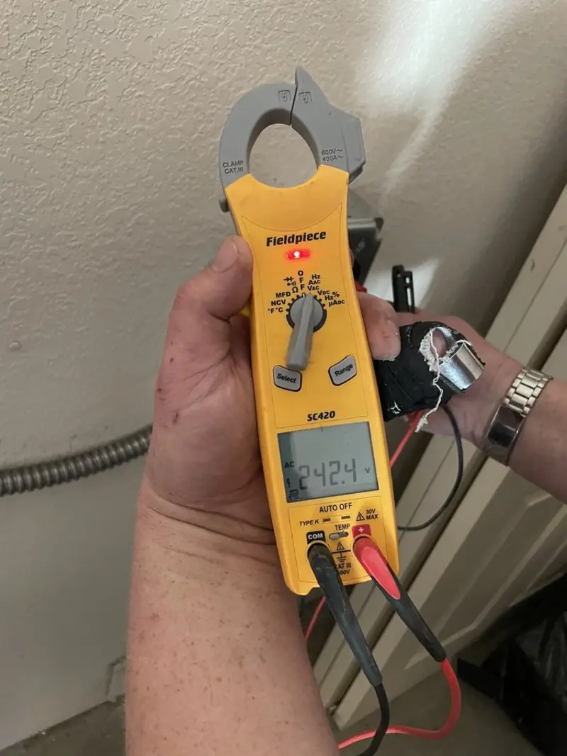 Voltage testing with clamp meter during Hot Tub / Pool Electrical Wiring in Lysander